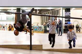 some children play in the turbine hall