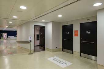 three toilet doors including a disabled toilet and baby changing room